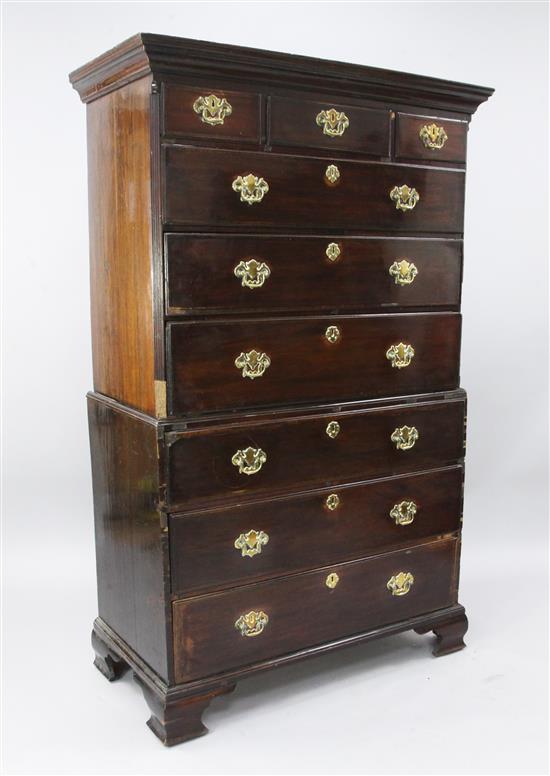 A George II mahogany and tulipwood banded chest on chest, W.3ft 6in. D.1ft 9in. H.5ft 9in.